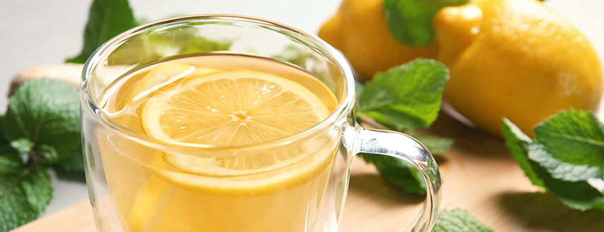 Warm lemon drink as part of a relaxing evening wellness routine